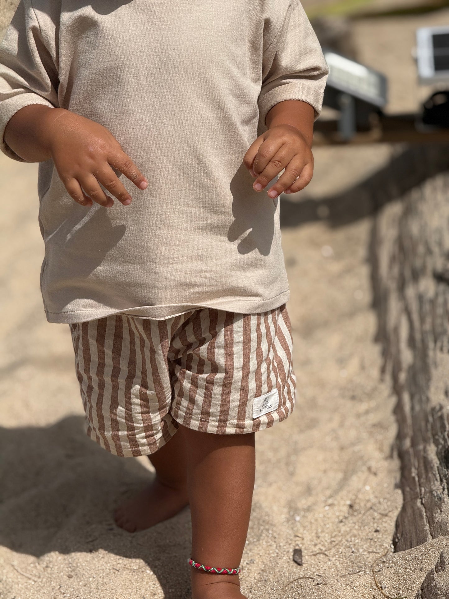 Summer shorts, dark beige striped