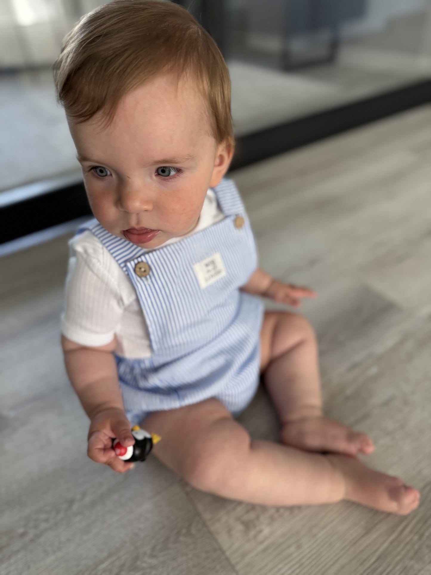 Short dungarees with stripes