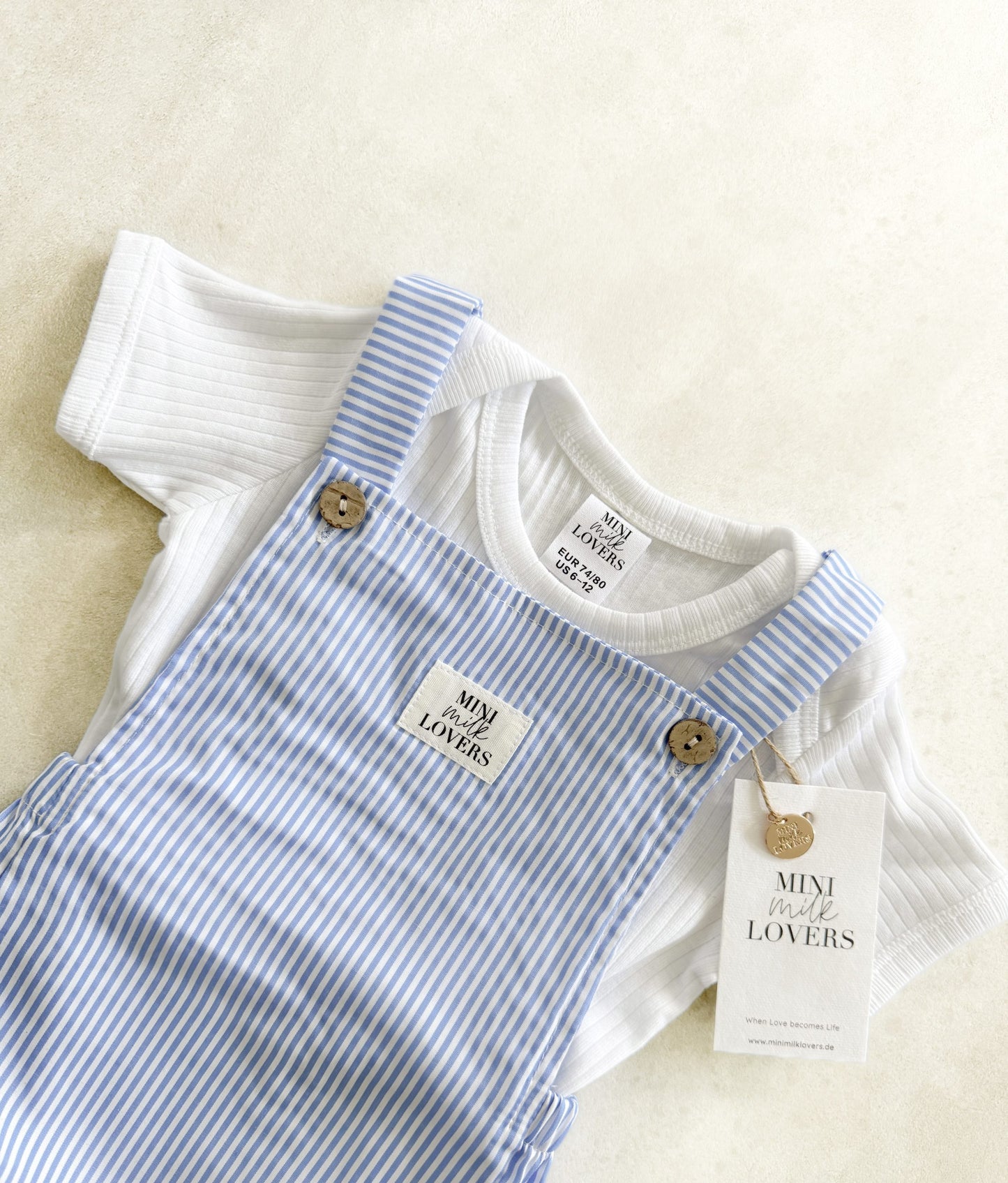 Short dungarees with stripes