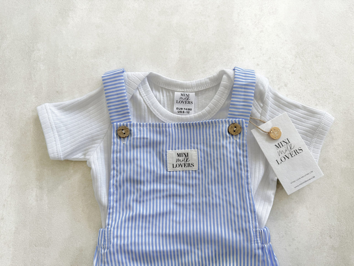 Short dungarees with stripes