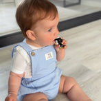 Short dungarees with stripes
